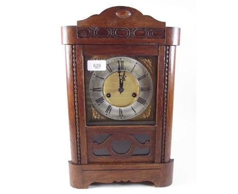 A vintage 1930's oak mantel clock - 39cm tall