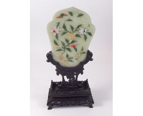 A Chinese 'jade' face screen with stone applied decoration on carved wood stand - 24cm