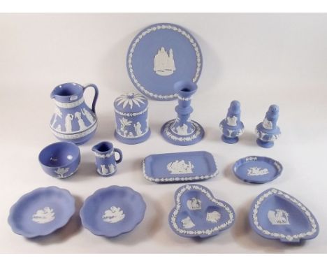 A quantity of Wedgwood Jasperware comprising cruet set, candlestick, covered pot, jug, cream jug and sugar, six trinket dishe