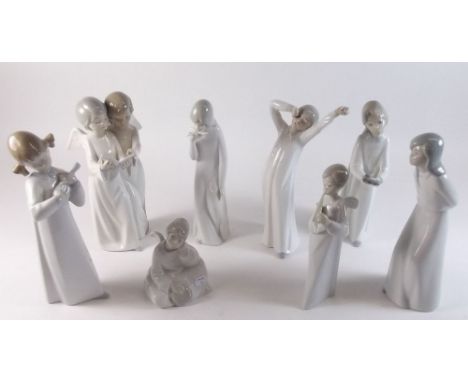 A group of eight Nao, Lladro and other Lladro style figures of angels and children