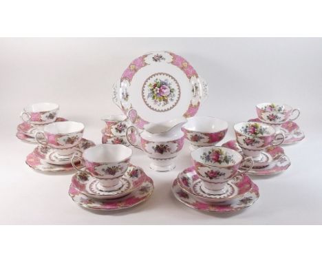 A Royal Albert Lady Carlyle tea service comprising:- six cups and saucers, milk jug, cream jug, small and large sugar and six