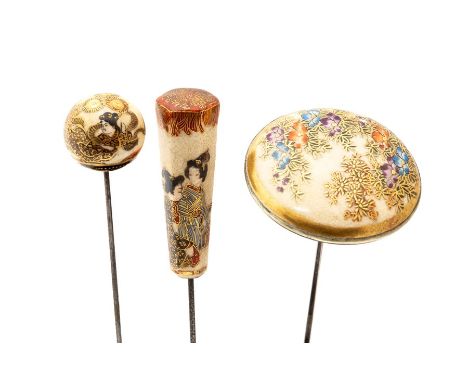 Three Japanese Satsuma ware hat pins, one globular, one disc and a long hexagonal (3)