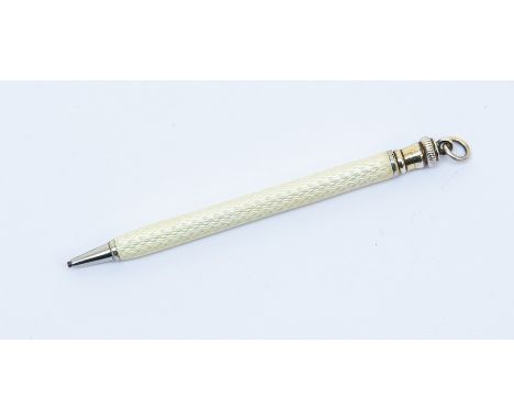 A silver and enamel pencil, engine turned decoration white guilloche, length approx 70mm