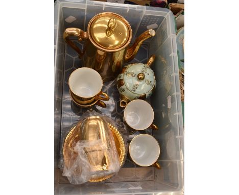 A Royal Worcester gilt glazed coffee service together with a Sadler style small teapot
