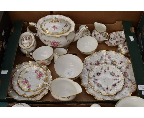 A group of Royal Crown Derby, Royal Pinxton Roses pieces including; teapot, sugar bowl, jug, plate, two cups and saucers, cov