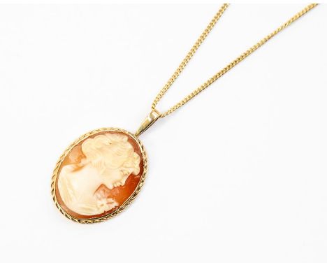 A 9ct gold cameo pendant, rose edge surround with gold bail, size approx 20mm x 35mm, on a 9ct gold chain, length approx 18''