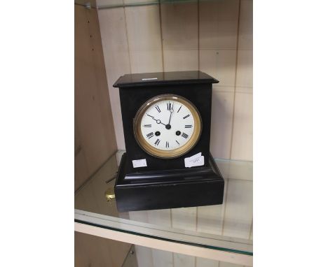 A Victorian slate 8 day striking mantel clock