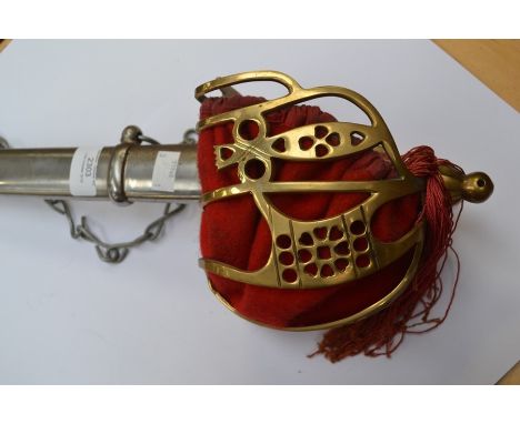 A replica Scottish Claymore style Sword. Double edged, double fullered blade 85 cm in length. No makers marks. Brass basket g