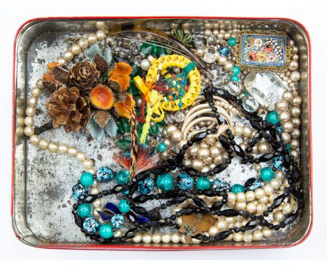A tin of 1920's and later vintage jewellery