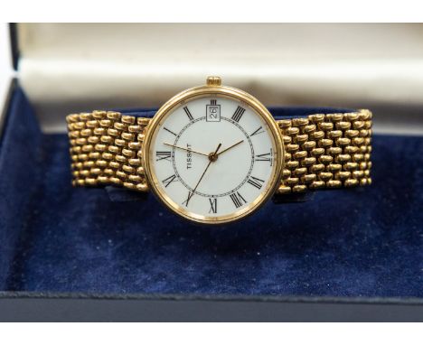 Late 1980 Tissot 9ct gold watch, 60 grams approx, with gold strap