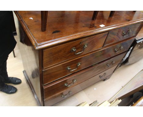 A George III mahogany chest of drawers, rectangular moulded top above  two short drawers over three long drawers with swan ne