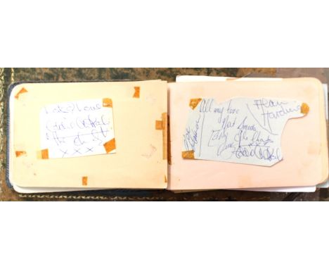 An autograph book containing a collection of various autographs, including; The Merseybeats, Bill Wyman and Charlie Watts, (R