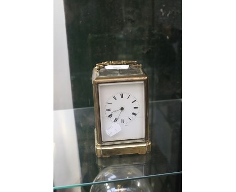 Edwardian brass carriage clock with repeater, Roman numerals A/F
