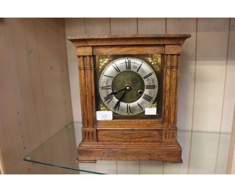 A 1930's 8 day strike oak cased mantel clock and a similar 1930's quartz movement oak cased mantel clock A/F&nbsp;
