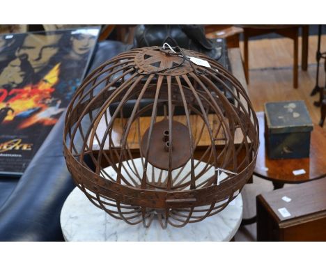 A cast iron openwork ships oil lantern, the top with floral motif and ring handle&nbsp;