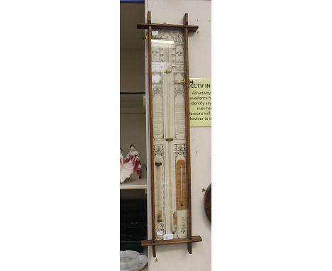 A George V oak cased stick barometer