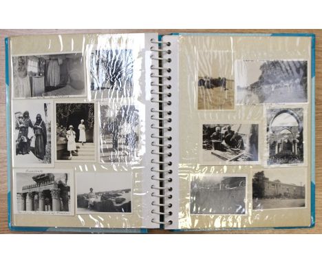 A collection of 6 photo albums along with various postcards and photos inc one portrait photo documenting the service of a Nu