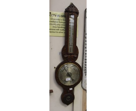 An oak cased barometer, circa 1900