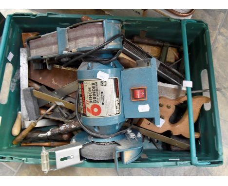 A collection of vintage tools, including chisels, rasps, saw, a Clarke International 6" bench grinder, some with wooden handl