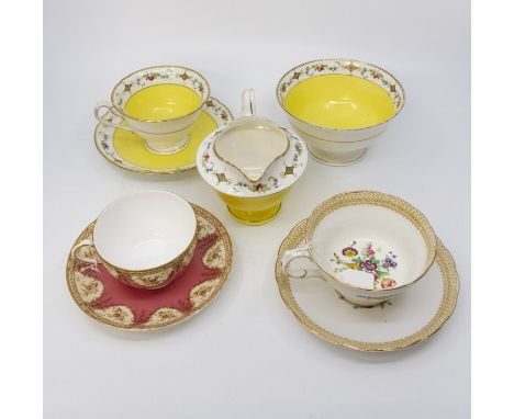 A small collection of ceramics to include; Shelley painted cup and saucer, yellow ground A8901/3, together with matching milk