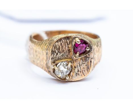 A gents 9ct gold ruby and diamond ring, cushion shaped top set with an&nbsp; old cushion cut diamond measuring approx. 5.6 x 