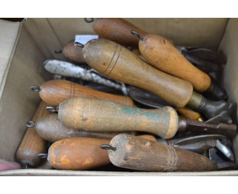 A collection of vintage push tin can openers, the majority with turned wooden handles, some with stylised animal heads (1 box