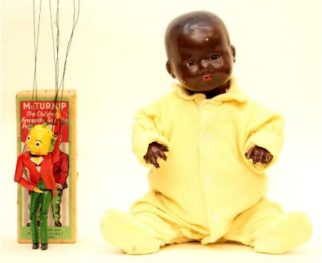 A boxed Mr Turnip: The Children's Favourite Television Puppet; together with an Armand Marseille black baby doll, open and cl
