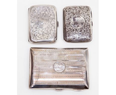 Two Edward VII silver cigarette cases, leafage scroll engraved Birmingham 1907 and 1909 and another George V cigar case engin