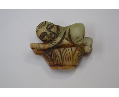 **REOFFER IN A&amp;C NOV £20-£30** A jade figure of a man on basket