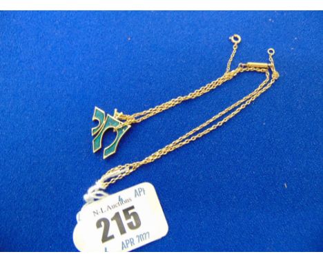 A 9ct Gold and Green enamel pendant, on a 9ct Gold chain