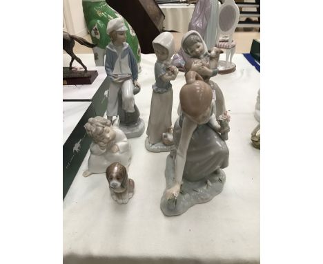 A quantity of lladro & Nao figures