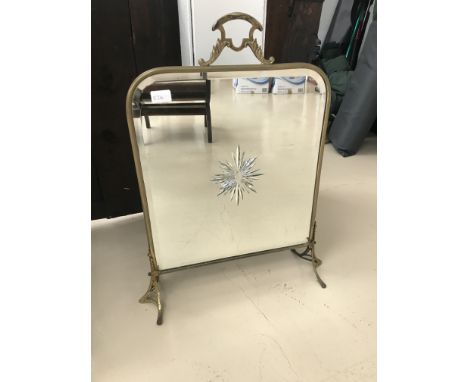 A Victorian mirrored brass fireguard