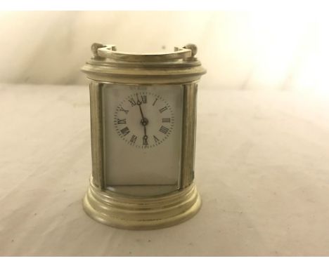 A circular carriage clock