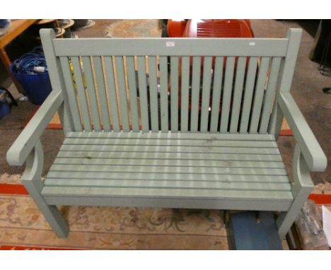 A green painted hardwood garden bench