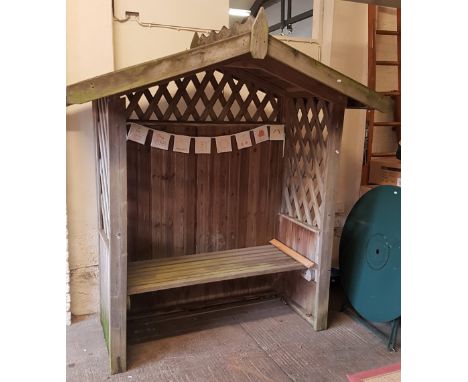 A hardwood covered garden bench