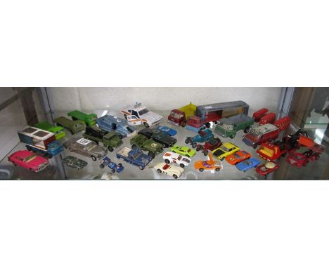 Shelf of die-cast vehicles to include Dinky