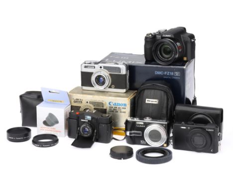 A Mixed Selection of Compact Cameras comprising a Canon Demi half frame 35mm camera with a Canon f/2.8 28mm lens, shutter wor