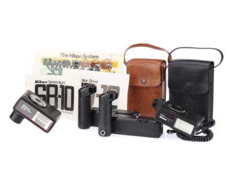 A Selection of Nikon SLR Accessories including two MD-12 motor drives with an instruction manual, an SB-10 and an SB-12 Speed
