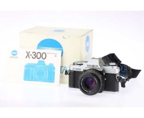 A Minolta X-300 SLR Camera, with Minolta MD f/1.8 50mm lens, body, VG, shutter working, lens, VG, in maker's boxIR302397