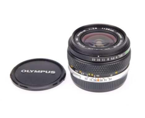 An Olympus OM Auto-W f/2.8 28mm Lens, body, VG-E, elements, VG, some very light internal haze IR943198