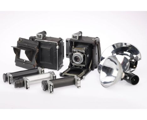 A Graflex Press Camera and Accessories comprising an Anniversary Speed Graphic 2¼ x 3¼in. camera with a Kodak Ektar f/4.5 101