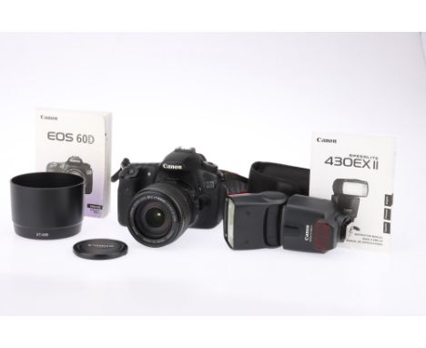 A Canon EOS 60D Digital SLR Camera, with Canon EF-S f/4-5.6 17-85mm lens, body, VG, powers up and appears to work lens, G-VG,