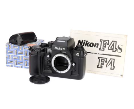 A Nikon F4 SLR Body black, 1988, serial no.2109882, untested, body F-G, with instruction manual, body cap, MB20 battery conta