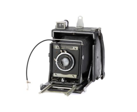 A Graflex Anniversary Speed Graphic Press Camera black, chrome trim, made by Folmer-Graflex, 1940-45, serial no.253661, quart