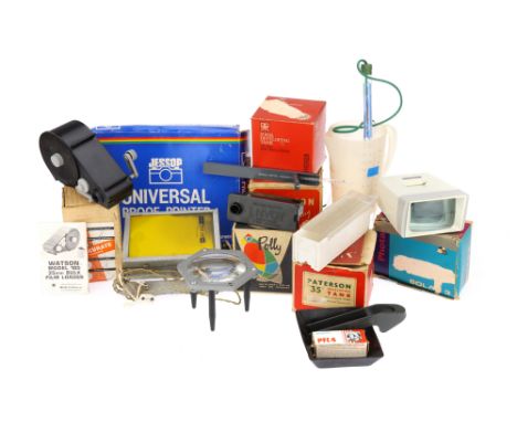 A Mixed Selection of Film Developing Tools, to include a Polly developing tank, a large desktop magnifier, a darkroom safelig