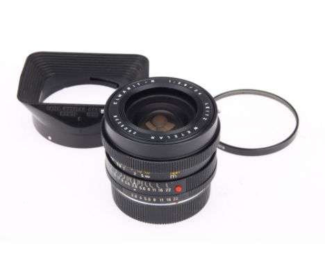 A Leitz Wetzlar Elmarit-R f/2.8 24mm Lens black, serial no.2905236, 1978, 3-cam, body G, signs of use, optics G-VG, very smal