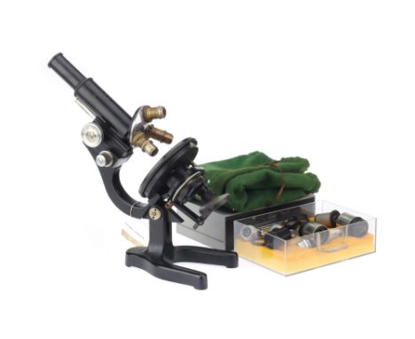 A WWII German Leitz Microscope German, c.1940, engraved to the body tube Ernst Leitz Wetzlar, No.360679, the microscope with 