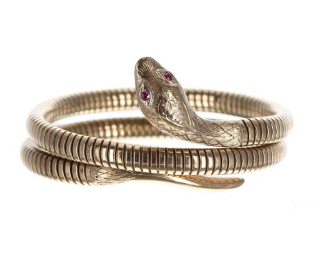 9ct snake sprung bangle with ruby set eyes, Birmingham&nbsp;1962, maker Smith &amp; Pepper, with steel spring, 29.7gm