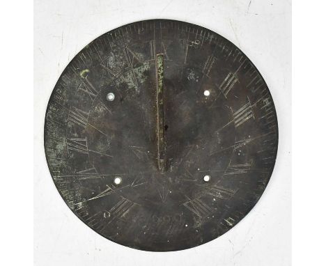 A 17th century bronze/brass sundial, with Roman numerals and outer minute track, impressed date of 1690, diameter 25cm.