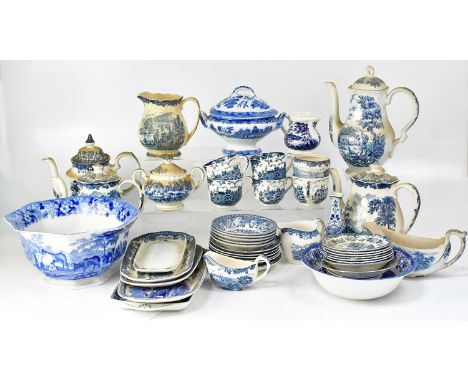 A quantity of blue and white part dinner and teaware, including Palissy 'Avon Scenes', 'Willow' pattern, etc, including teapo